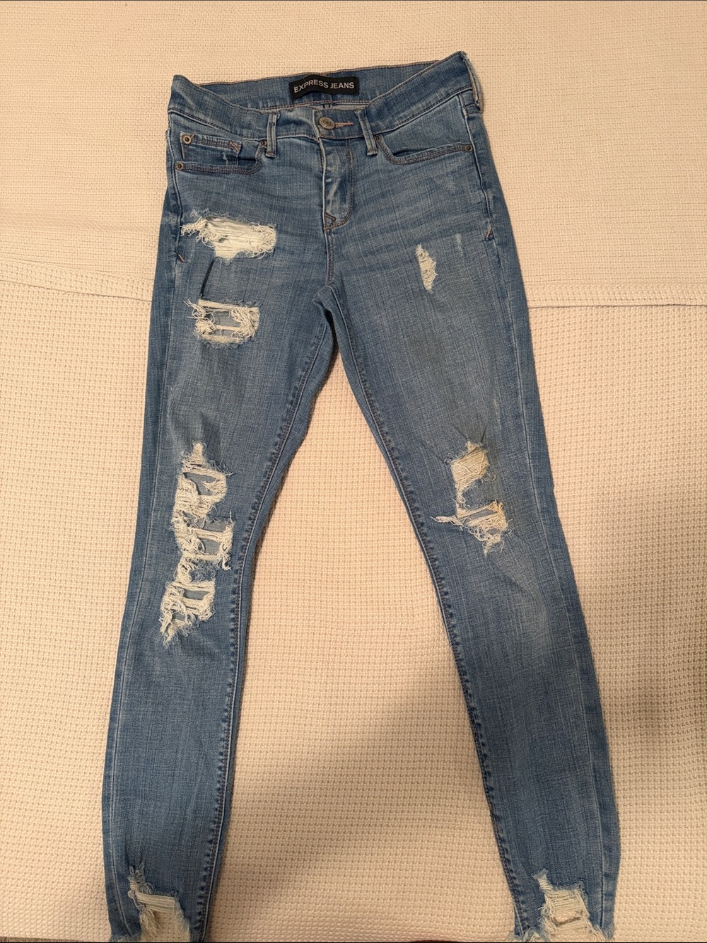 Express Distressed Skinny Jeans in Light Blue